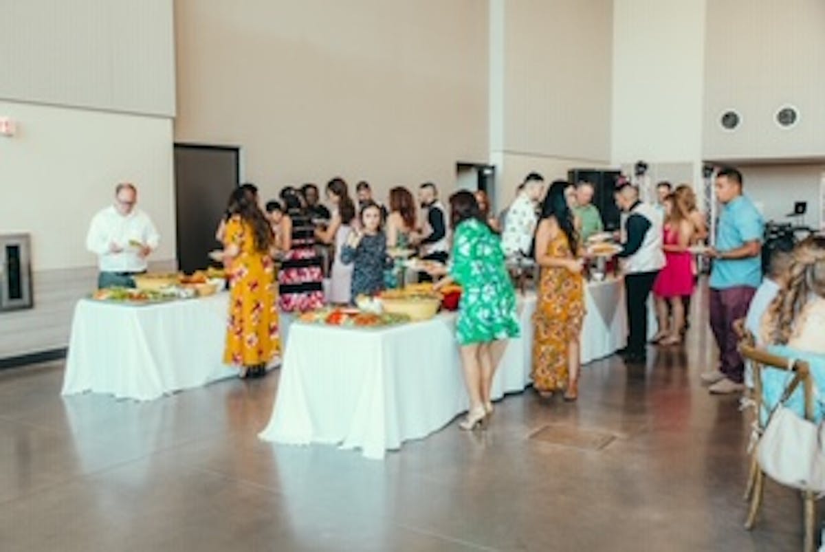 a group of people standing in a room